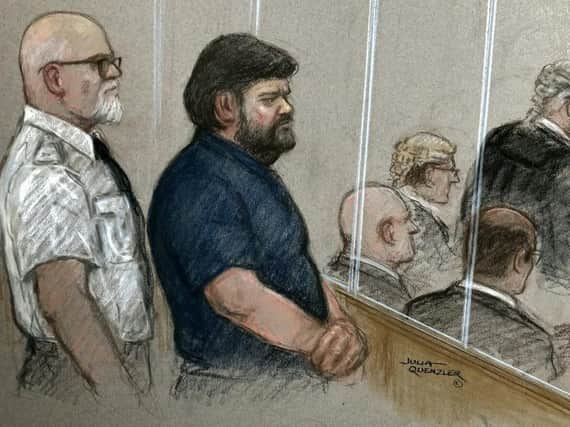 Artists impression of Carl Beech (wearing blue) in the dock at Newcastle Crown Court (Picture: Julia Quenzler/SWNS)