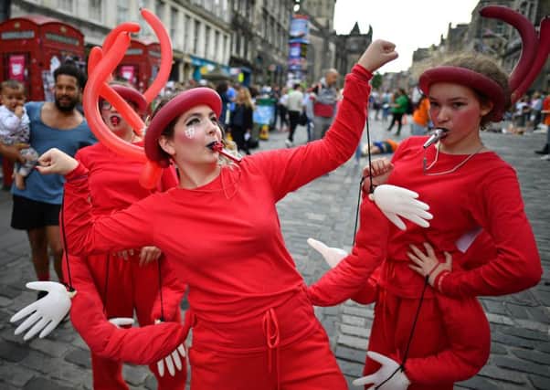 Street performers on the Royal Mile, Edinburgh, 5 August 2019 PIC: Jeff J Mitchell/Getty Images
