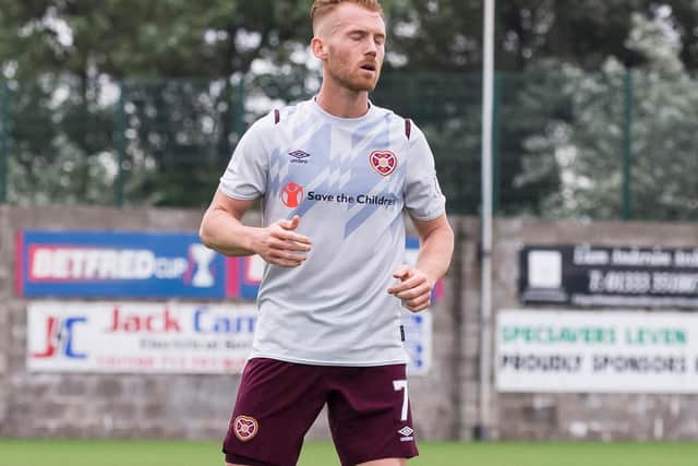 Nowhere near the standard of the home and third kits. Maroon shoulder flashes doesn't suit the colour of the shirt which features a crude design.