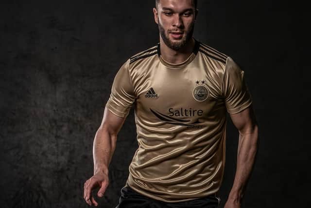 It is very... gold. A little too gold. And very shiny. Better than last season's reverse.