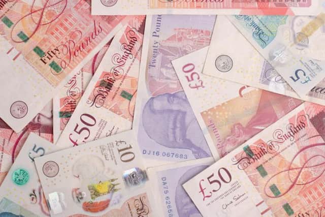 The Currency and Banknotes act of 1928 makes it an offence to deface a banknote by printing, stamping or writing on it. The Coinage act also makes it illegal to destroy a UK metal coin current since 1969 without a licence.