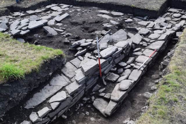 Excavation of the northern outer wall of the Norse 'drinking hall'