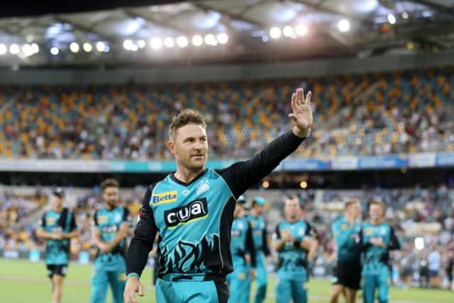Brendon McCullum acknowledges fans as he makes his way from the field after a Brisbane Heat v Melbourne Stars Big Bash League Match at The Gabba