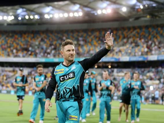 Brendon McCullum acknowledges fans as he makes his way from the field after a Brisbane Heat v Melbourne Stars Big Bash League Match at The Gabba
