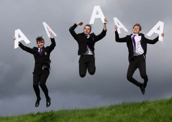 Barrhead High School pupils jump for joy at their exam results (Picture: Mark F Gibson)