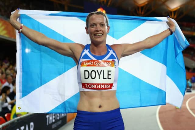 Eilidh Doyle celebrates winning silver in the 400m hurdles at the 2018 Commonwealth Games in Gold Coast. Picture: Michael Steele/Getty Images