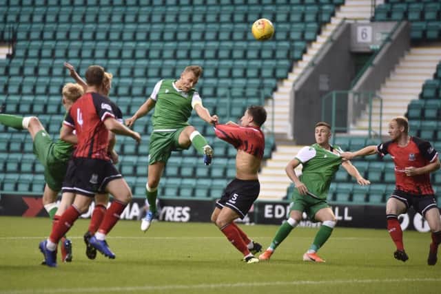 Ryan Porteous heads in the opener for Hibs U21 against Elgin. Picture: Andrew O'Brien