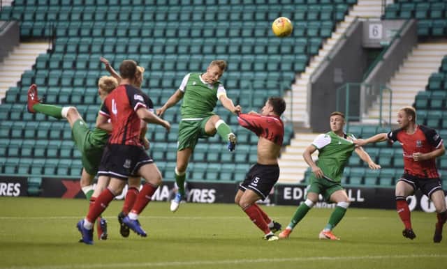 Ryan Porteous heads in the opener for Hibs U21 against Elgin. Picture: Andrew O'Brien