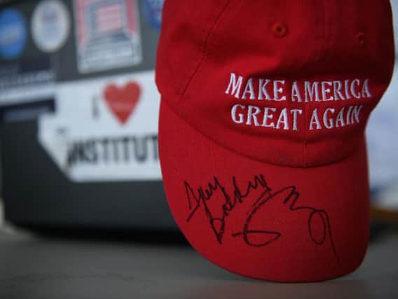 Some people bought a 'Make America Great Again' cap thinking it would be a political curiosity of Donald Trump's failed election bid. But then he won. (Picture: Getty)
