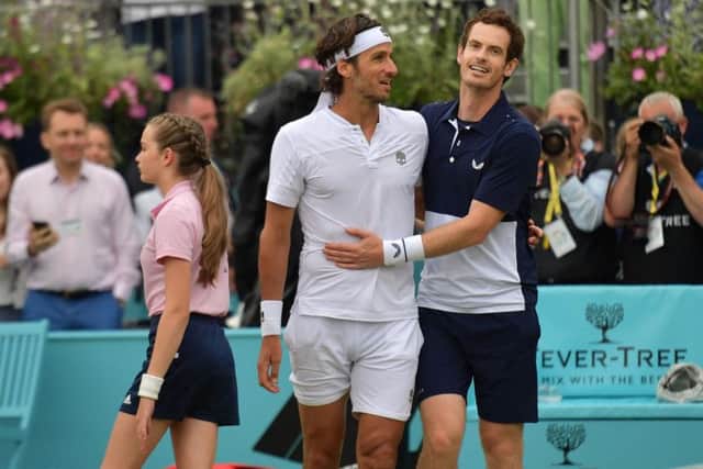 File image of Feliciano Lopez (left) with Andy Murray