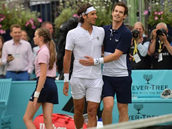 File image of Feliciano Lopez (left) with Andy Murray
