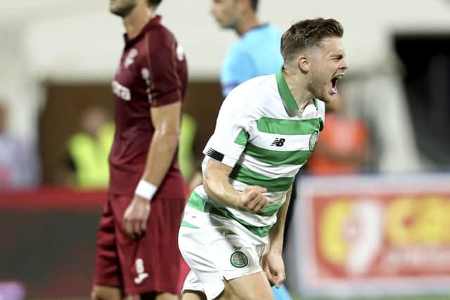 James Forrest celebrates after levelling for Celtic in the 37th minute.