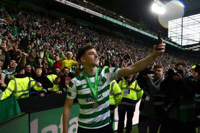 Kieran Tierney takes a selfie with the Celtic fans