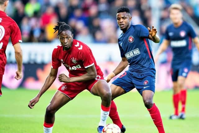 Rangers' Joe Aribo (left) battles with fellow goalscorer Frank Ogochukwu Onyeka of Midtjylland in Herning