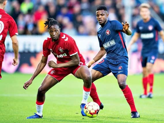 Rangers' Joe Aribo (left) battles with fellow goalscorer Frank Ogochukwu Onyeka of Midtjylland in Herning