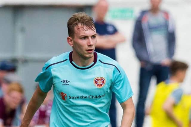 Hearts midfielder Lewis Moore has joined Falkirk on loan. (Evening News)
