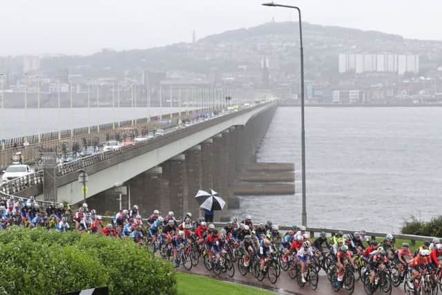 The peloton heads south after crossing the Tay Bridge from Dundee on the curtailed first stage of the Womens Tour of  Scotland. Picture: SWPics.com