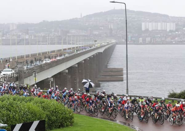The peloton heads south after crossing the Tay Bridge from Dundee on the curtailed first stage of the Womens Tour of  Scotland. Picture: SWPics.com
