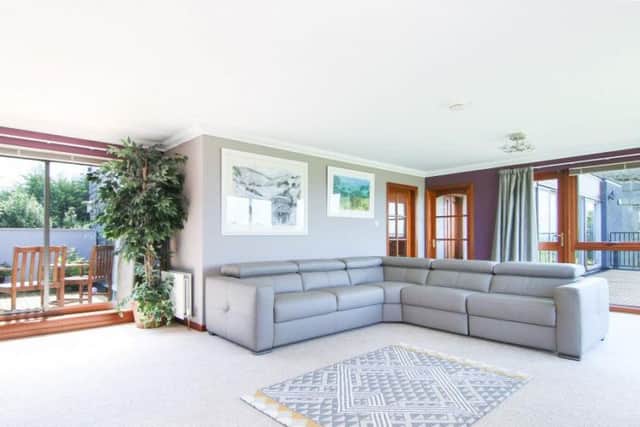 The modern, spacious living room in the main house.