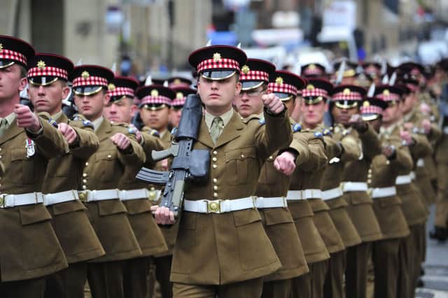 1st Battalion Scots Guards parade in Glasgow on their return from Afghanistan in 2003. Picture: Robert Perry