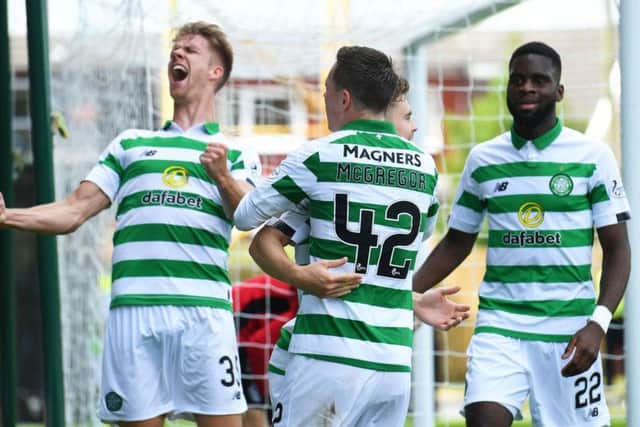 Kristoffer Ajer, Callum McGregor, James Forrest and Odsonne Edouard celebrate