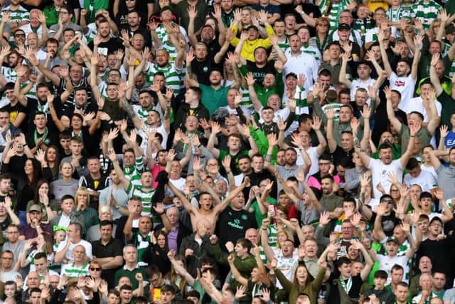 Celtic supporters celebrate at Fir Park