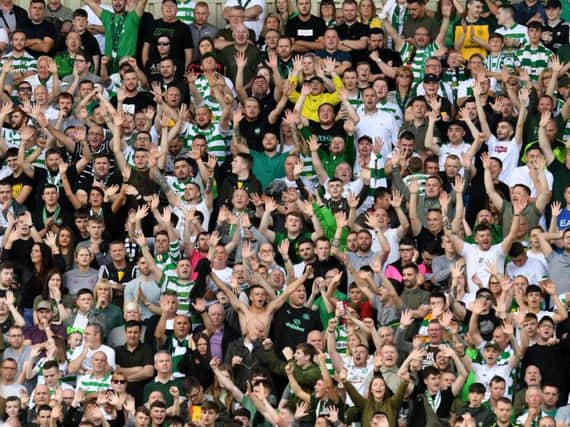 Celtic supporters celebrate at Fir Park
