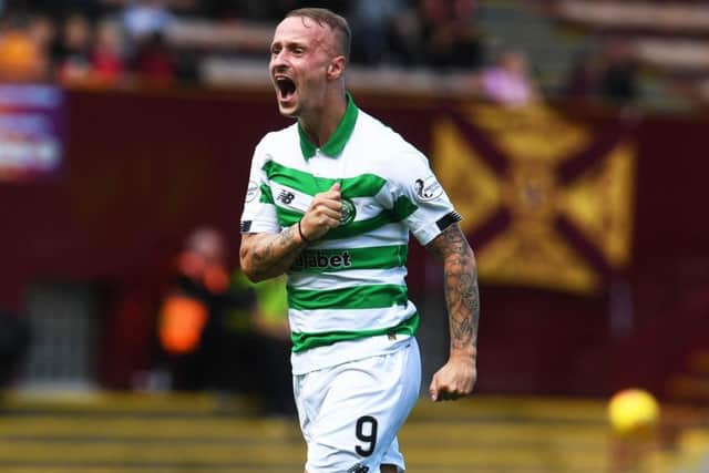 Leigh Griffiths celebrates making it 2-1 to Celtic at Fir Park. Picture: Craig Foy/SNS.