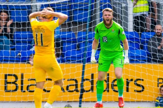 Zander Clark saved a late penalty from Livingston's Lyndon Dykes