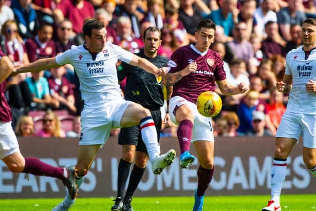 Jamie Walker competes for the ball.