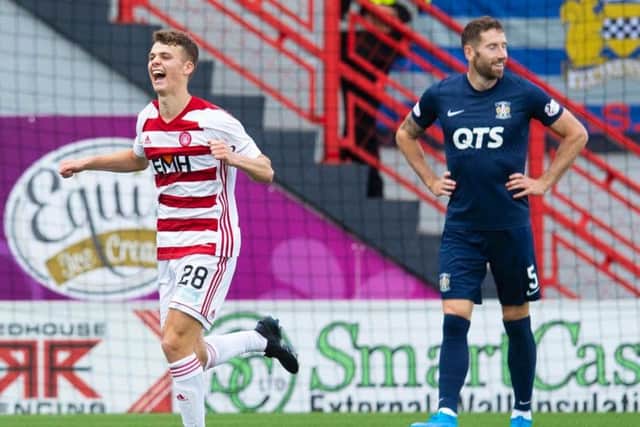 Hamilton's Lewis Smith celebrates