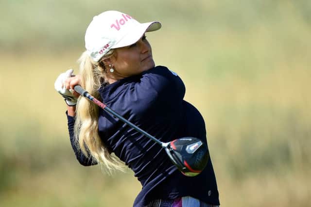 Carly Booth plays her tee shot at the second  hole during the third round at the Renaissance Club.