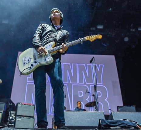 Johnny Marr before he had to temporarily leave the Ross Bandstand stage  in Princes Street Gardens because of lightning. Picture: Calum Buchan.