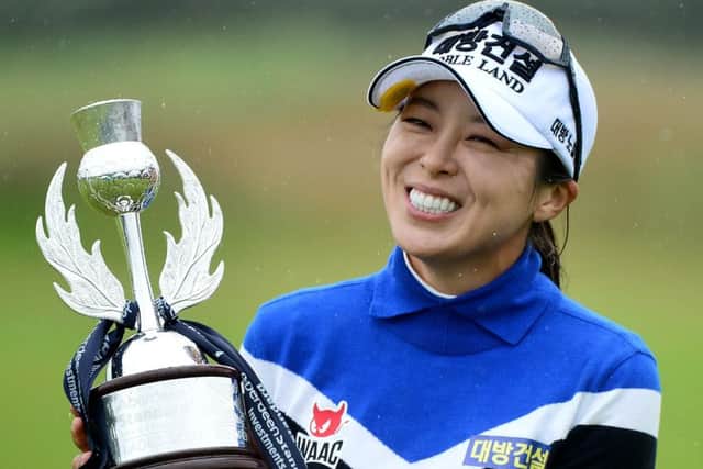 Koreas Mi Jung Hur shows her delight after picking up a new ASI Ladies Scottish Open trophy. Picture: Getty.