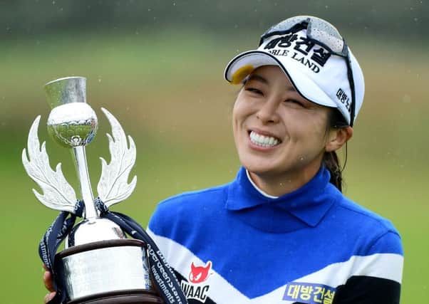 Koreas Mi Jung Hur shows her delight after picking up a new ASI Ladies Scottish Open trophy. Picture: Getty.