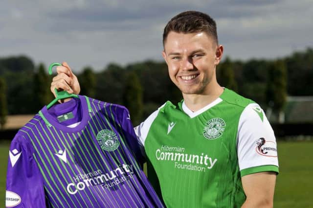Glenn Middleton is unveiled by Hibs after his protracted loan move was finally concluded. PictureL SNS.