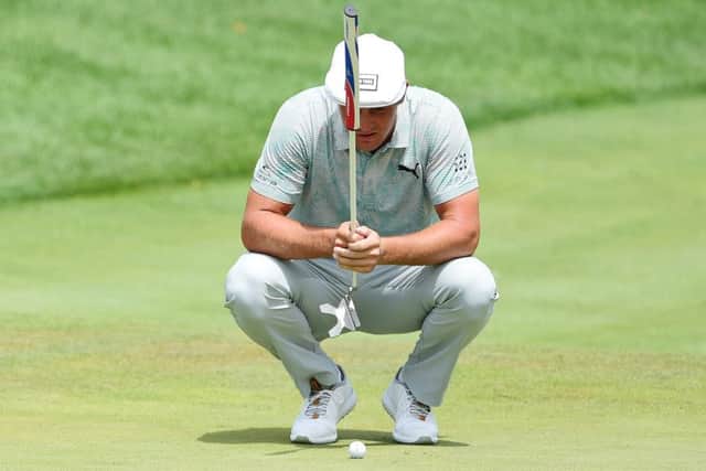Bryson DeChambeau has been criticised for the times he takes to line up a putt. Picture: Jared C. Tilton/Getty Images
