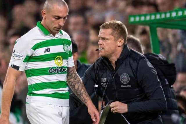 Scott Brown cuts a dejected figure after being substituted against Cluj