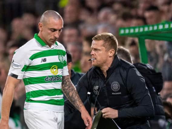 Scott Brown cuts a dejected figure after being substituted against Cluj