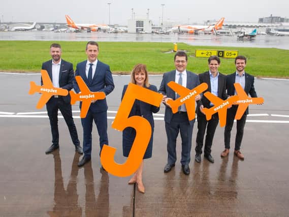 EasyJet UK manager Ali Gayward with fellow airline and airport officials to mark its fifth aircraft to be based at Glasgow. Picture: easyJet