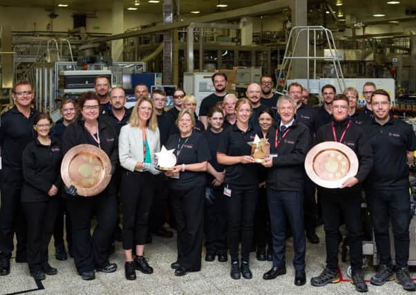 Trade minister Ivan McKee celebrates Leven packaging plant's global award. Picture: Tracy Gow