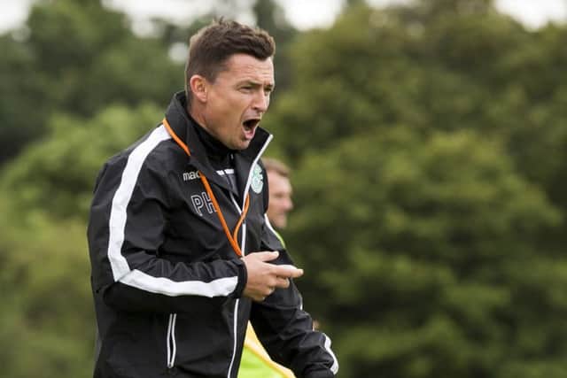 Hibs manager Paul Heckingbottom shouts out in training. Picture: Bruce White/SNS