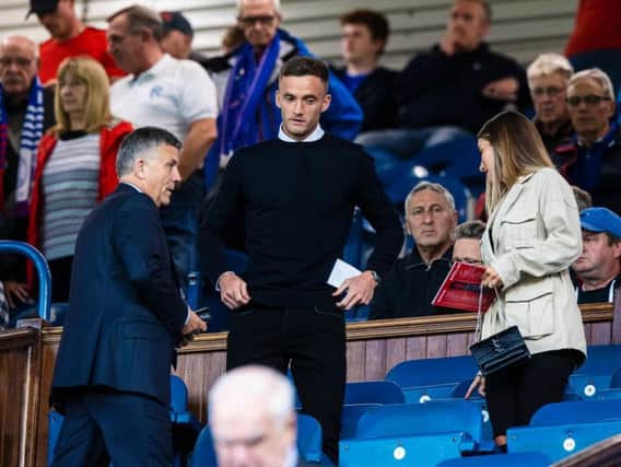 Andy King takes in the Rangers game prior to joining from Leicester on a season-long loan