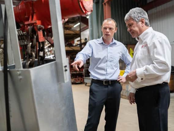 James Gregg, director of sales and operations at Motive Offshore, with Bill Aitken, managing director of Red Rooster Lifting. Picture: Contributed