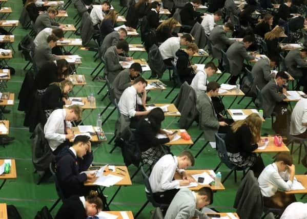 At present National 4 does not involve formal exams but relies on continuous assessment. Picture: Gareth Fuller/PA