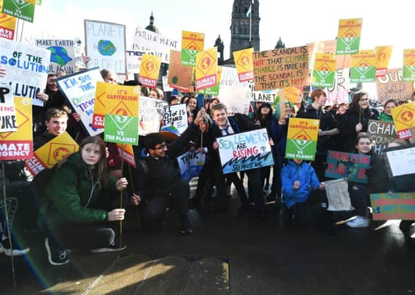 Glasgow's second climate change strike takes place as pupils descend on George Square. Picture: John Devlin
