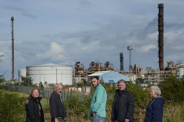 James Glen with members of the Mossmorran Action Group outside the plant which has now been shut down for repairs. Photograph: Jon Savage