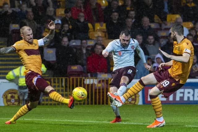 Hearts' Michael Smith scores a fine opening goal against Motherwell. Picture: Bill Murray/SNS