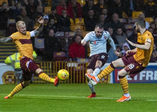 Hearts' Michael Smith scores a fine opening goal against Motherwell. Picture: Bill Murray/SNS