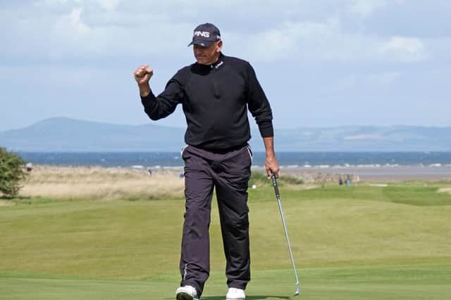 Australian Peter Fowler celebrates after a closing birdie in the Scottish Senior Open at Craigielaw. Photograph: Phil Inglis/Getty Images